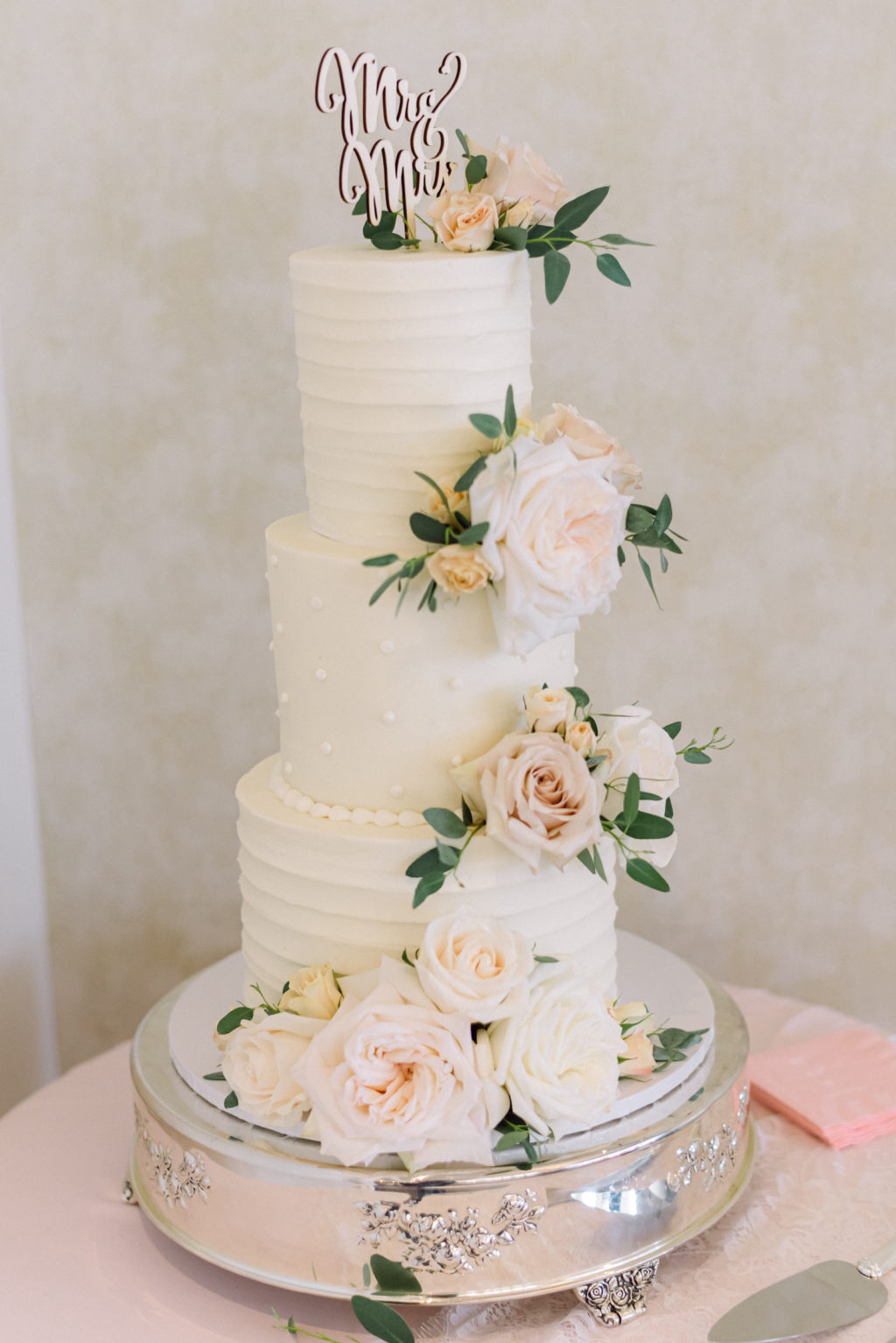 Three Tier Textured Wedding Cake with Blush Pink Roses and Custom Cake Topper