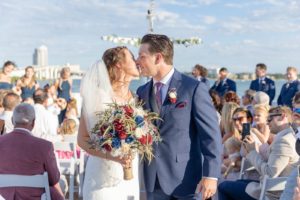 Bride and Groom Kiss Down the Aisle Portrait | Tampa Florida Nautical Wedding Venue | Yacht StarShip Clearwater