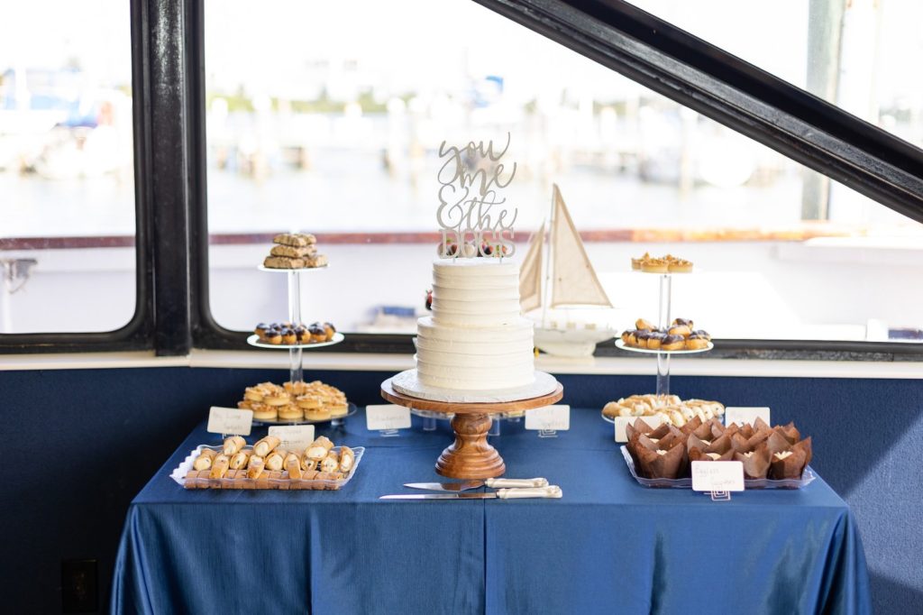Reception Wedding Dessert Table with Two Tiered White Round Wedding Cake