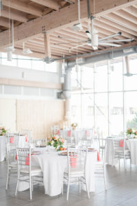 Tropical Wedding Reception Decor, Silver Chiavari Chairs, Pink Linen Napkins | Light and Airy Wedding Venue Tampa River Center | Tampa Bay Wedding Planner Coastal Coordinating