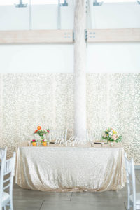 Tropical Elegant Wedding Reception Decor, Sweetheart Table with Gold Glitter Linen, Mr and Mrs Sign and Colorful Flower Bouquets | Tampa Bay Wedding Planner Coastal Coordinating