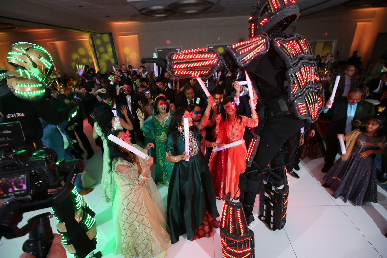 Tampa Clearwater Beach Indian Wedding Dance Floor Party with Glow Stick Wands and Robot Dancers