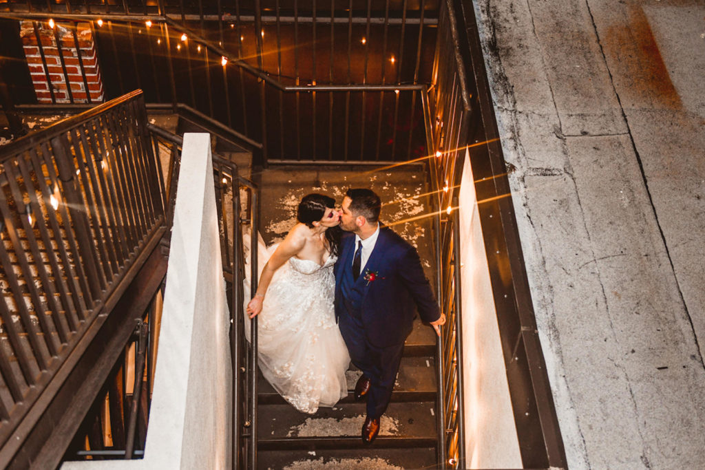 Tampa Bride and Groom Kissing on Outdoor Steps
