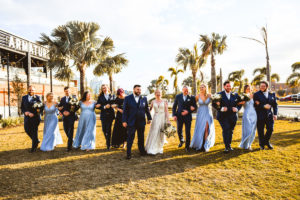 Florida Bride in Lace and Tulle Boho Wedding Dress, Bridesmaids in Mix and Match Dusty Blue Dresses and Groomsmen in Blue Suits | Tampa Bay Wedding Hair and Makeup Femme Akoi | Industrial Wedding Venue Armature Works