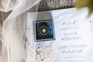 Round Diamond Solitaire Wedding Engagement Ring, Bride and Groom Wedding Bands in Blue Velvet Ring Box, Blue Watercolor and Gold Foil Splatter Wedding Invitation