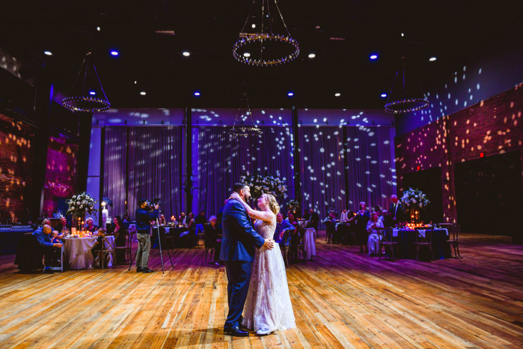 Bride and Groom First Dance During Wedding Reception | Tampa Bay Industrial Wedding Venue Armature Works | Wedding DJ Grant Hemond and Associates