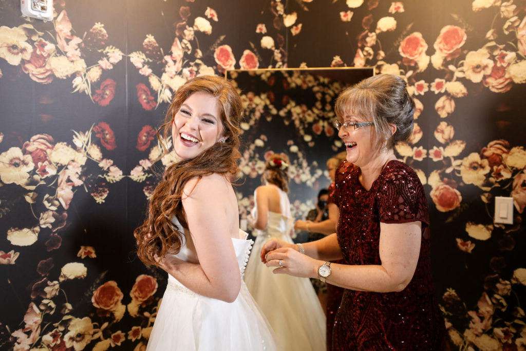 Mother of the Bride helping Bride get Dressed and Ready at Tampa Wedding Venue Hyde House | Lifelong Photography Studio