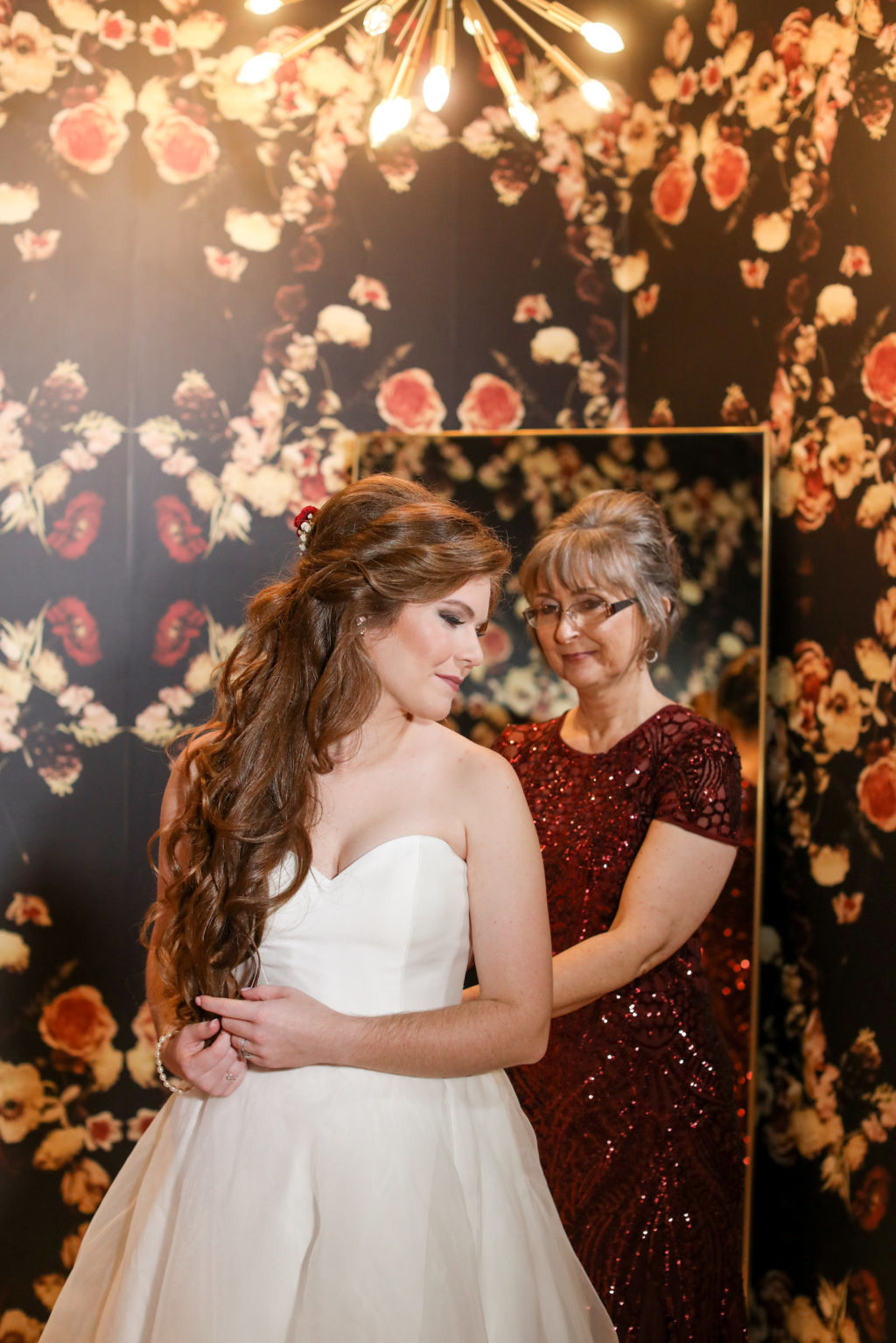 Mother of the Bride helping Bride get Dressed and Ready at Tampa Wedding Venue Hyde House | Sincerity Bridal Designer Wedding Dress Bridal Gown with Sweetheart Neckline | Lifelong Photography Studio