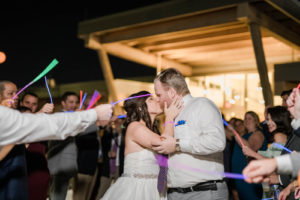 Fun Bride and Groom Glow Sticks Wedding Exit Photo