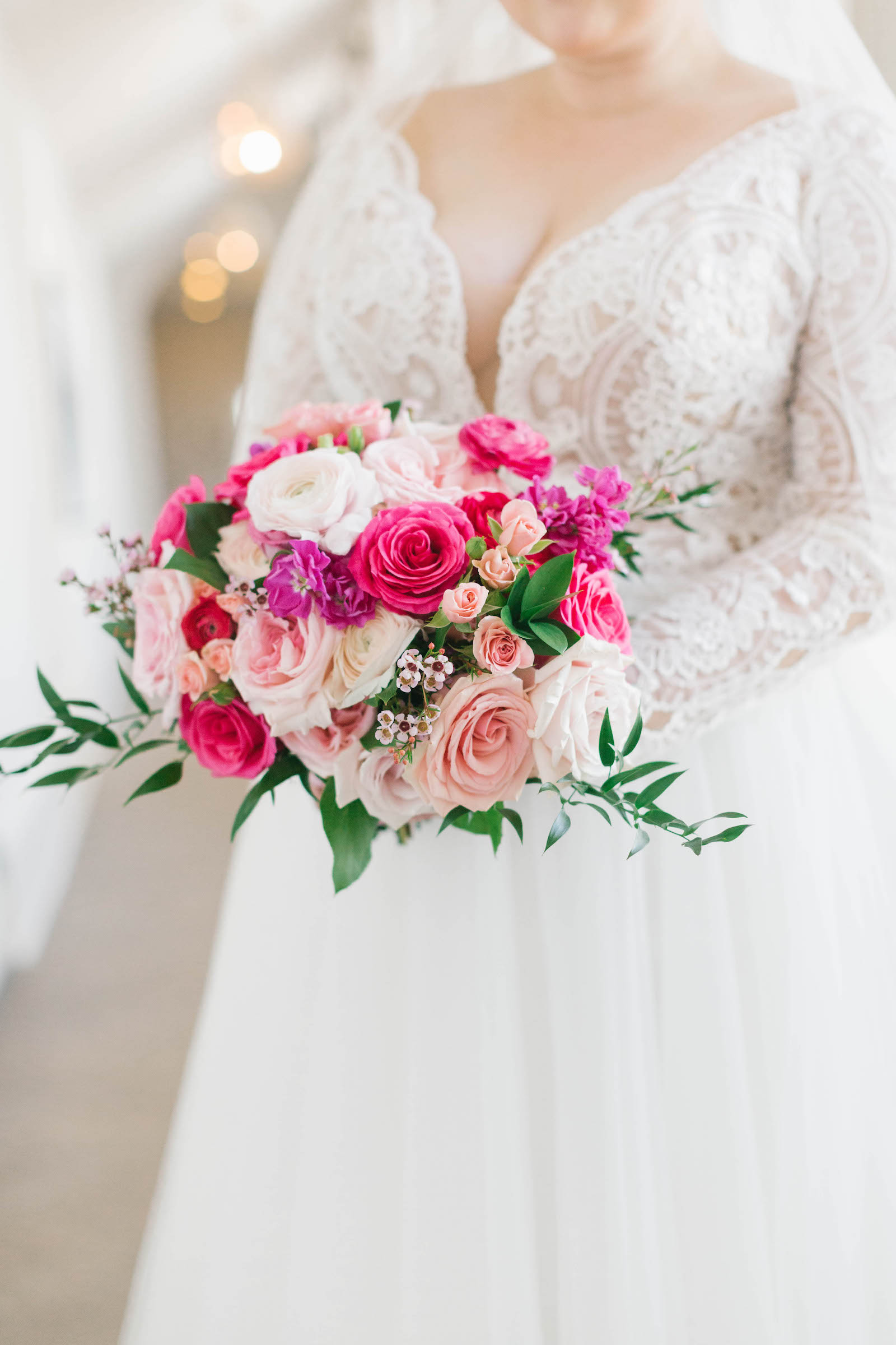 St. Pete Bride Wearing Lace and Illusion Wedding Dress Holding Vibrant Pink Roses, Purple and White Floral Bouquet | Tampa Bay Wedding Florist Bruce Wayne Florals
