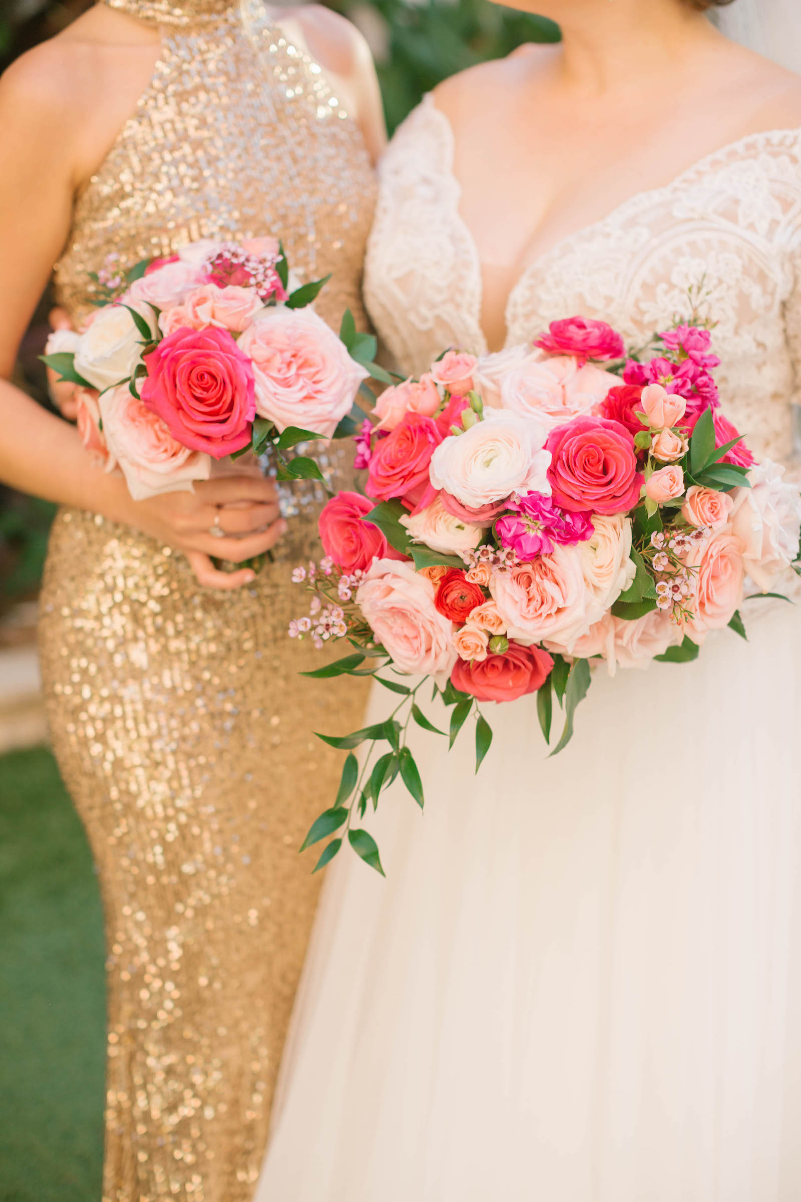 Tampa Bay Bride in Lace and Illusion Long Sleeve Wedding Dress Holding Vibrant Pink, Blush Roses Floral Bouquet with Bridesmaid in Gold Sequin Dress | Tampa Bay Wedding Florist Bruce Wayne Florals
