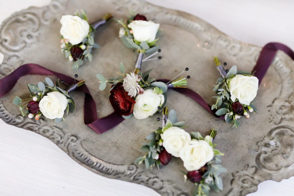 White Roses and Dark Red Floral Groom Wedding Boutonnieres | Tampa Bay Wedding Florist Monarch Events and Design
