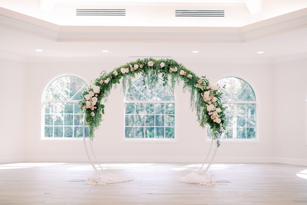 Timeless Romantic Wedding Ceremony Decor, Round Arch with Greenery and Ivory, Blush Florals | Safety Harbor Wedding Traditional Ceremony Venue Harborside Chapel | Wedding Planner Special Moments Event Planning