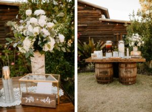 Florida Rustic Barn Wedding Beverage Station with Iced Tea and Water on Wood Barrel Table | Gold Geometric Glass Wedding Card Box with White Rose and Greenery Centerpiece Floral Arrangement