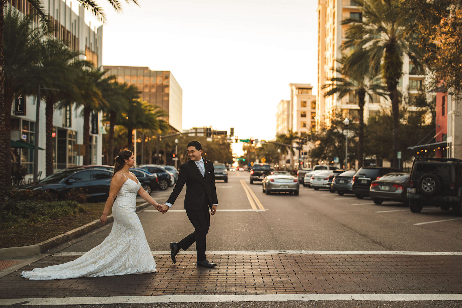 Tampa Bride and Groom Crossing Street in St. Petersburg