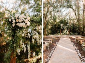 Outdoor Wedding Ceremony with Wood Benches and Wood Arch at Plant City Wedding Venue Florida Rustic Barn Weddings | Ceremony Backdrop wood Arch Arbor with Greenery and White Roses and Suspended Hanging Stock Flowers