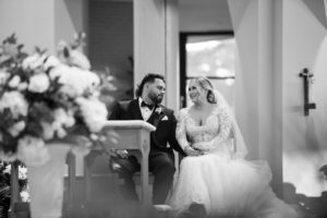 Tampa Bride and Groom Exchanging Vows During Traditional Church Wedding Ceremony St. Jude's Cathedral | Wedding Planner Parties A'la Carte