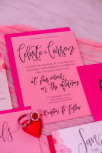 Valentine Inspired Pink and Red Stationery Wedding Invite Flat Lay