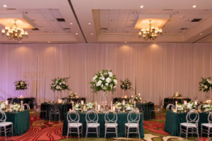 Elegant Wedding Reception Decor, Emerald Green Linens, Acrylic Chiavari Chairs, Tall White and Greenery Floral Centerpieces | Tampa Bay Wedding Planner Parties A'la Carte | Wedding Florist Bruce Wayne Florals | Table and Chair Rentals A Chair Affair | St. Pete Wedding Venue The Vinoy