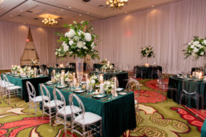 Elegant Wedding Reception Decor, Emerald Green Linens, Acrylic Chiavari Chairs, Tall White and Greenery Floral Centerpieces | Tampa Bay Wedding Planner Parties A'la Carte | Wedding Florist Bruce Wayne Florals | Table and Chair Rentals A Chair Affair | St. Pete Wedding Venue The Vinoy