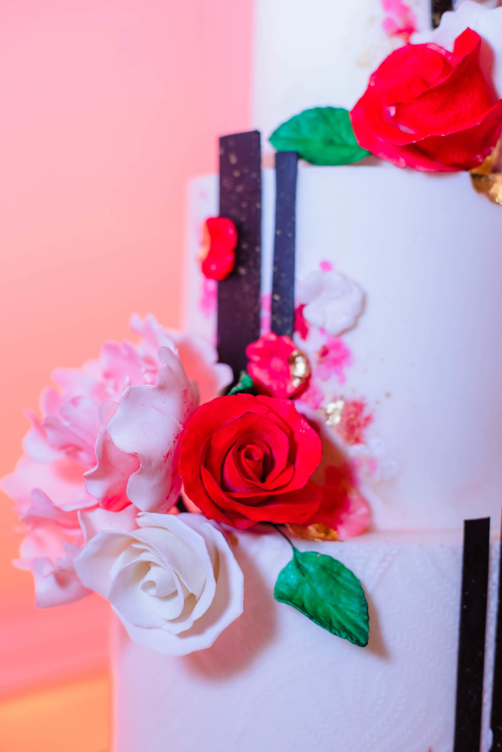Valentine Inspired Wedding Cake with Red, White and Pink Sugar Flowers | Tampa Bay Cake Company