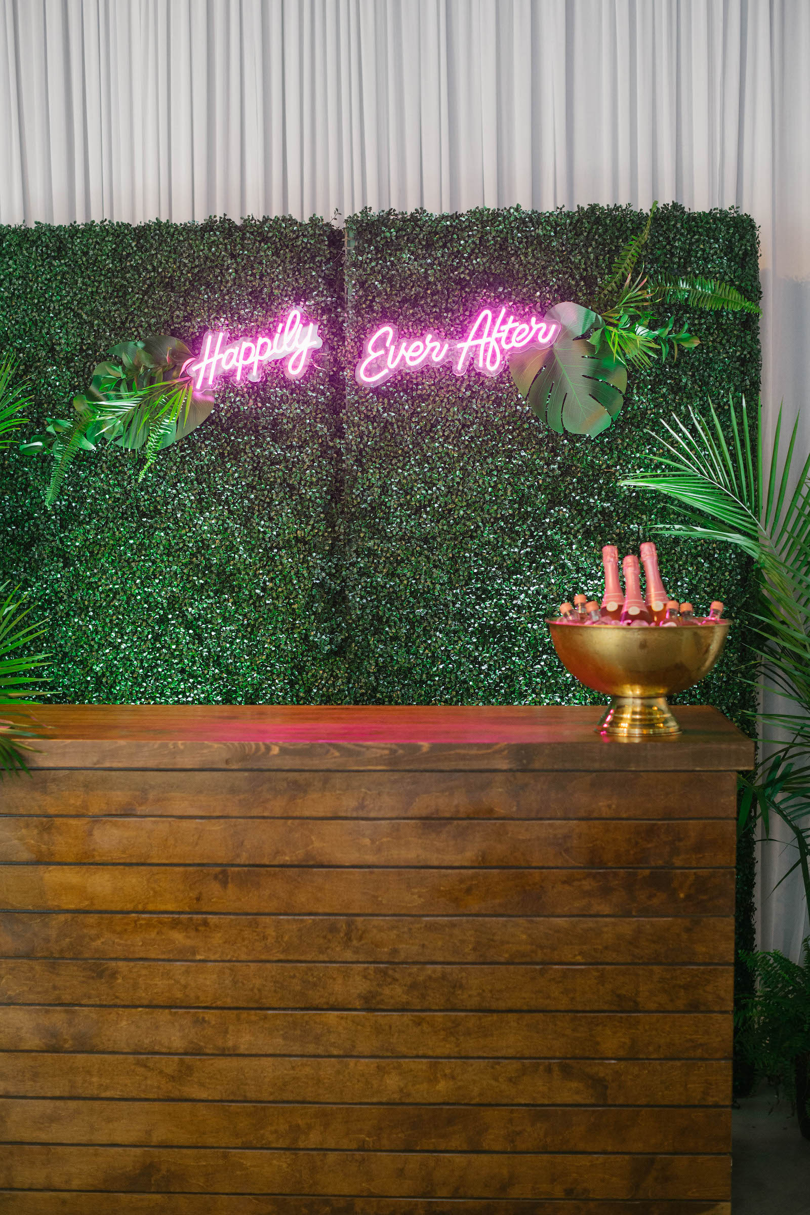 Greenery Boxwood Bar Backdrop with Neon Happily Ever After Sign Tropical Destination Beach Wedding Inspiration | Bellwether Beach Resort Styled with Love by Marry Me Tampa Bay