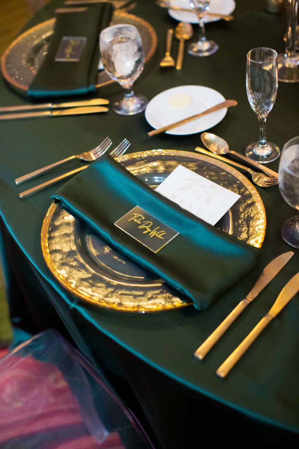 Elegant Wedding Reception Decor, Emerald Green Linens, Gold Chargers and Flatware, Acrylic Place Card | Tampa Bay Wedding Planner Parties A'la Carte | Wedding Rentals A Chair Affair
