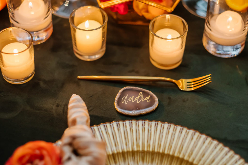 Moroccan Inspired Elopement Wedding Reception Decor, Gold Flatware and Charger, Votive Candles, Agate and Gold Script Place Card | Tampa Bay Wedding Planner UNIQUE Weddings + Events | Wedding Rentals Kate Ryan Event Rentals