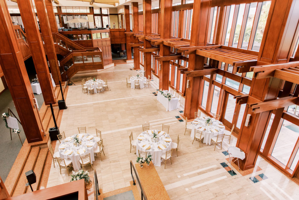 Modern Minimal Wedding Reception Decor, White Tables and Gold Chiavari Chairs with Greenery | Tampa Bay Wedding Photographer Kera Photography | St. Pete Wedding Venue Poynter Institute