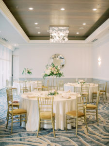 Timeless Romantic Wedding Reception Decor, Round Tables with White Linens, Gold Chiavari Chairs, Blush and Ivory with Greenery Floral Centerpieces | Wedding Venue Hyatt Regency Clearwater Beach | Tampa Bay Wedding Planner Special Moments Event Planning | Wedding Rentals Kate Ryan Event Rentals