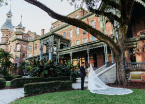 Timeless Bride in Full Length Veil Holding Hands Out Front University of Tampa