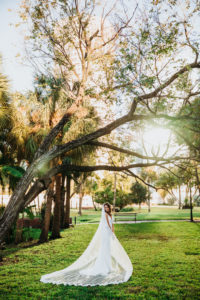 Sunset Portrait of Timeless Florida Bride in Full Length Lace Trim Veil