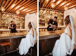 Fun Tampa Groom Bartending Behind Vintage Bar Serving Drinks to Bride