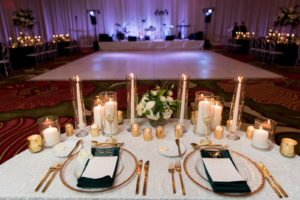 Elegant Wedding Reception Decor, Sweetheart Table with Ivory Lace Linen, Gold Rimmed Chargers and Flatware, White Candles | Tampa Bay Wedding Planner Parties A'la Carte | St. Pete Wedding Venue The Vinoy | Wedding Rentals A Chair Affair | Wedding Florist Bruce Wayne Florals