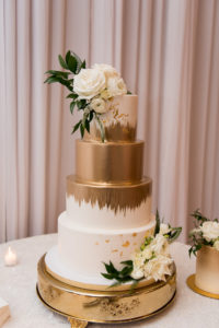 Elegant Classic White and Gold Painted Four Tier Wedding Cake with White Roses | Tampa Bay Wedding Baker The Artistic Whisk | Wedding Florist Bruce Wayne Florals | Tampa Bay Wedding Planner Parties A'la Carte