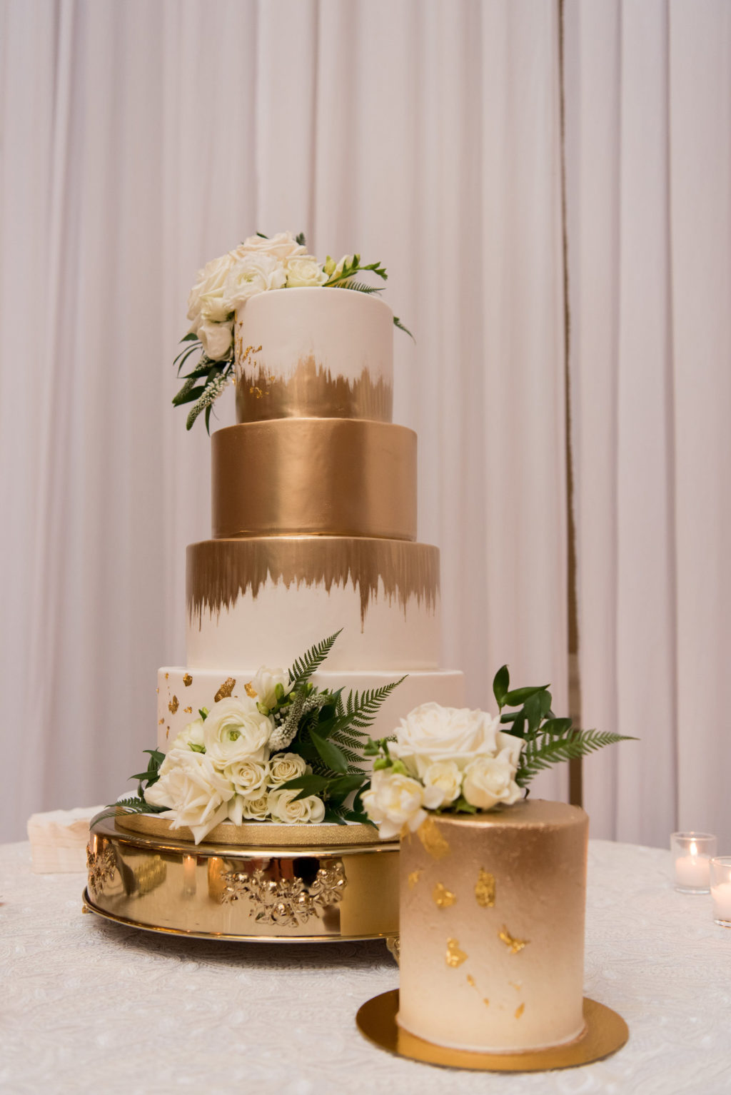 Elegant Classic White and Gold Painted Four Tier Wedding Cake with White Roses | Tampa Bay Wedding Baker The Artistic Whisk | Wedding Florist Bruce Wayne Florals | Tampa Bay Wedding Planner Parties A'la Carte