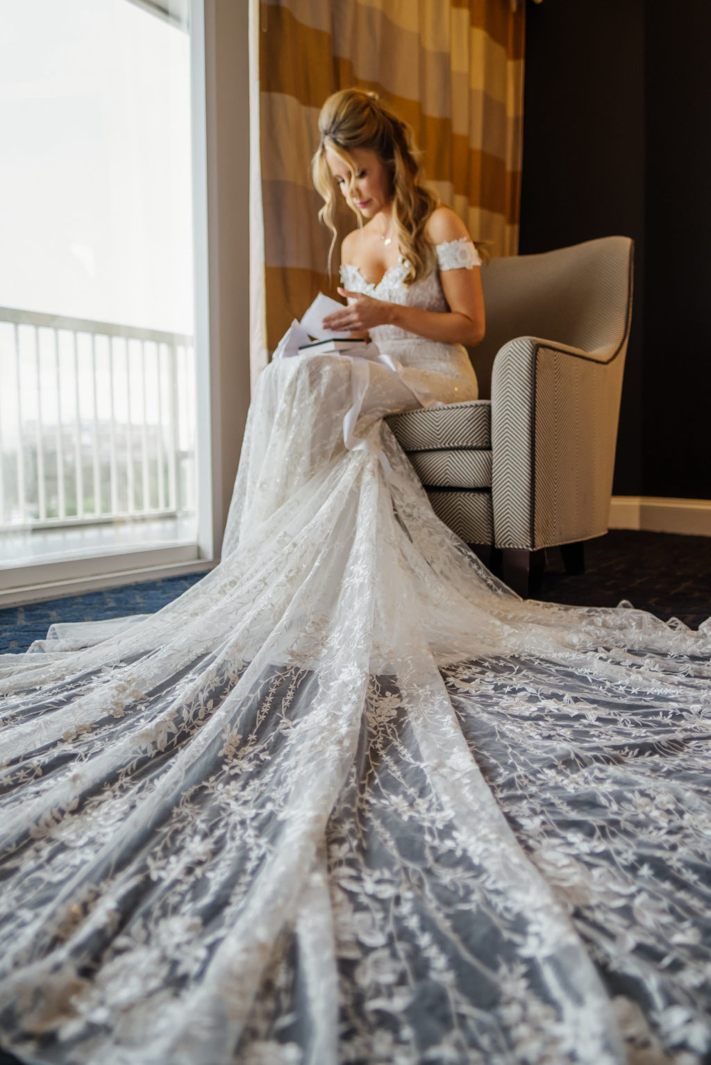 Tampa Bride Reading Letter in Romantic Lace Off the Shoulder Wedding Dress | Bridal Wedding Portrait