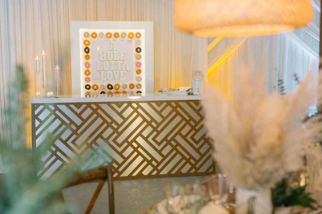 Modern Gold Bar Donut Station with Sign | Unique Reception Decor IdeasStyled | With Love at St. Pete Beach Wedding Venue Bellwether Beach Resort