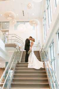 Bride and Groom Wedding Portrait on Staircase | Modern South Tampa Wedding Venue Aloft Midtown | Wedding Photographer and Videographer Bonnie Newman Creative | Wedding Dress Truly Forever Bridal