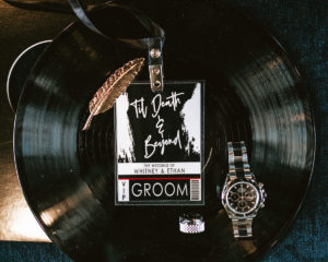 Edgy Urban Black VIP Concert Ticket Backstage Pass Style Wedding Invitation on Record, Gold Feather and Groom Accessories Watch and Ring | Tampa Bay Wedding Photographer Bonnie Newman Creative