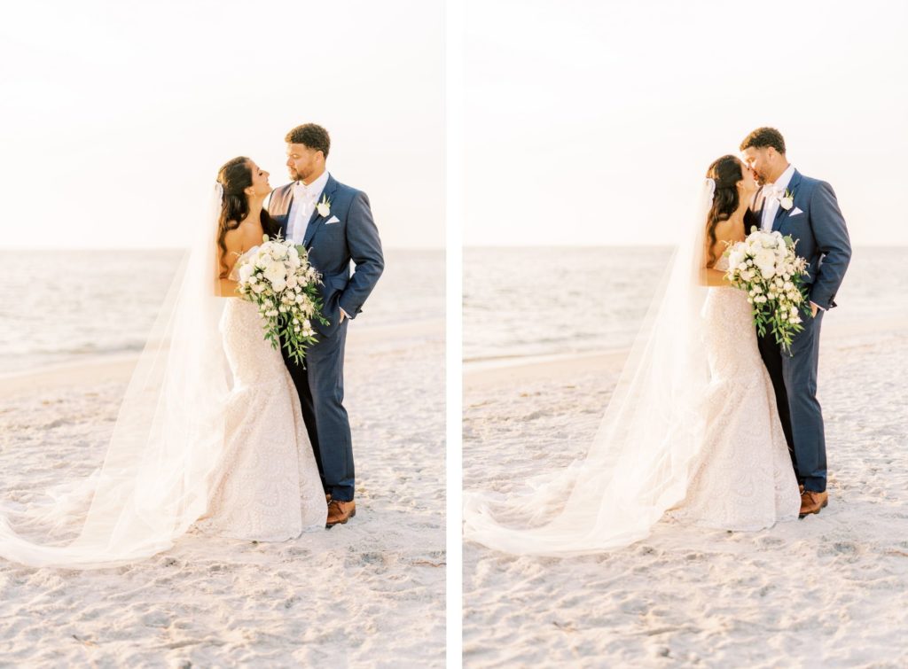 Elegant Bride Wearing Mermaid Beaded Strapless Wedding Dress and Full Length Veil Holding White Floral Lush Bouquet and Groom on the Beach | Tampa Bay Wedding Photographer Kera Photography