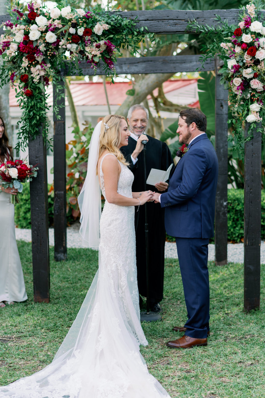 Tampa Bay Bride and Groom Exchanging Wedding Vows During Ceremony | Clearwater Wedding Venue Carlouel Beach and Yacht Club