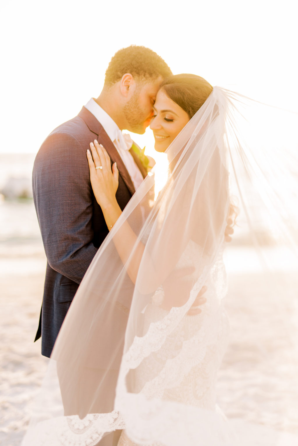 Sunset Bride in Full Length Veil and Groom Portrait on Beach | Tampa Bay Wedding Photographer Kera Photography