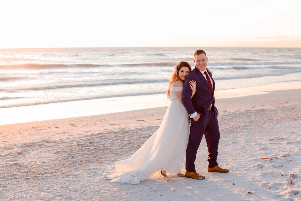 Florida Sunset Photo of Bride and Groom on the Beach | St. Pete Beach Wedding Venue Postcard Inn | Tampa Bay Wedding Photographer Lifelong Photography Studio