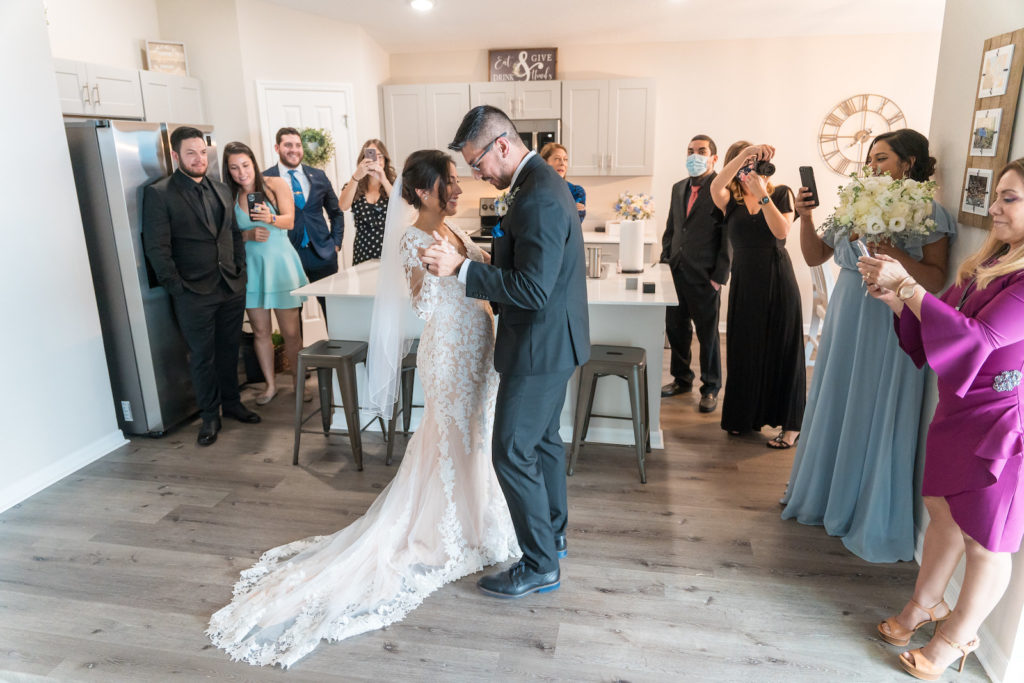 Intimate Private Home Wedding Reception, Bride and Groom Dancing in Kitchen | Tampa Bay Wedding Planner Eventfull Weddings