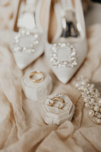 Classic Florida Wedding Day Bridal Details, Octagon Velvet Ring Box Yellow with Gold Diamond Engagement Ring and Earring Studs, Badgley Mischka White Wedding Shoes, Pearl Hair Pendant