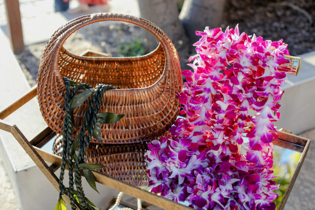 Tropical Hawaiian Wedding Reception Decor, Vintage Bar Cart with Woven Basket, Purple Orchid Flower Leis | Tampa Bay Wedding Photographer Lifelong Photography Studio