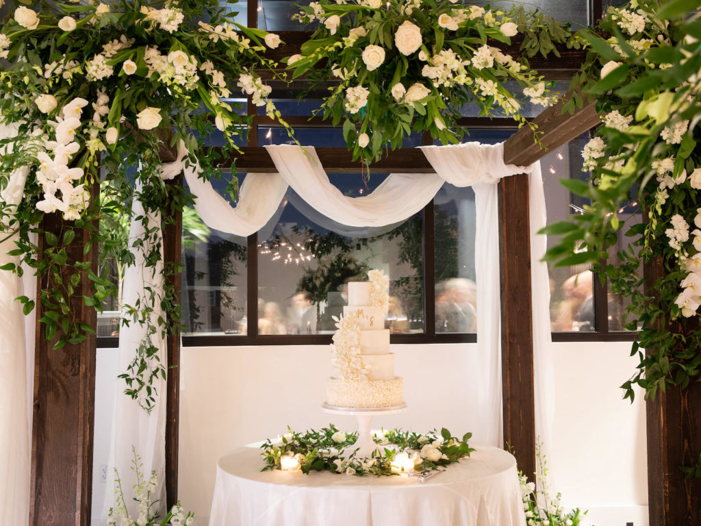 Traditional Wedding Reception Decor, Wooden Huppa with Greenery and White Roses, Orchids Floral Arrangements and Linen Draping, Five Tier Classic White Wedding Cake