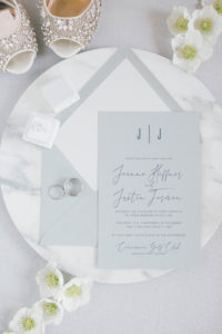 Classic Modern Powder Blue Wedding Invitation Suite and Wedding Rings on Round Marble Tray