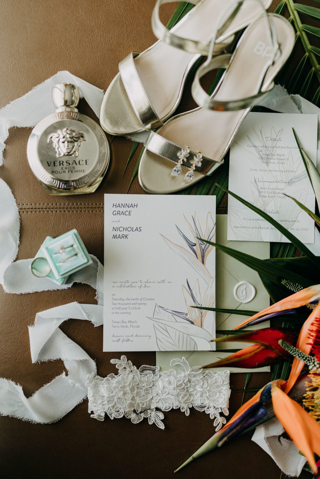 Tropical Elegant Wedding Invitation, Sage Green, White Invitation with Tropical Floral Design, Silver Strappy Wedding Shoes, Versace Perfume Bottle, Wedding Rings in Mint Green Box | Tampa Bay Wedding Photographer Amber McWhorter Photography